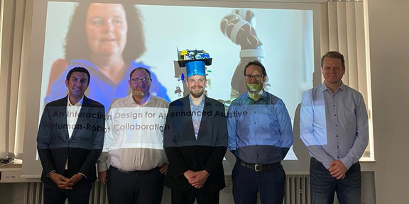 The PhD committee of Dr. Max Pascher: Amr Rizk Stefan Schneegass, Jens Gerken, and Michael Prilla