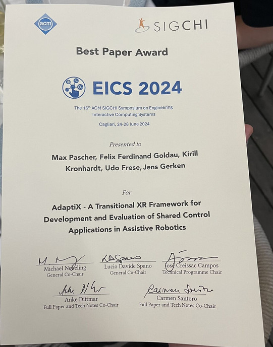 Best Paper Award - AdaptiX - A Transitional XR Framework for Development and Evaluation of Shared Control Applications in Assistive Robotics - Max Pascher - HRI Reseracher